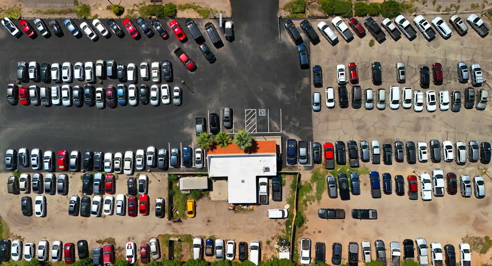 aerial drone photograph of a car dealership lot in Tucson Arizona.