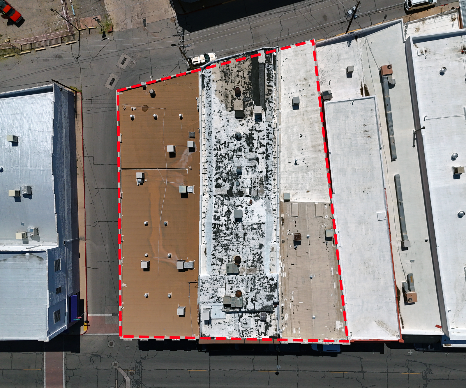 aerial drone photograph of a roof with damage