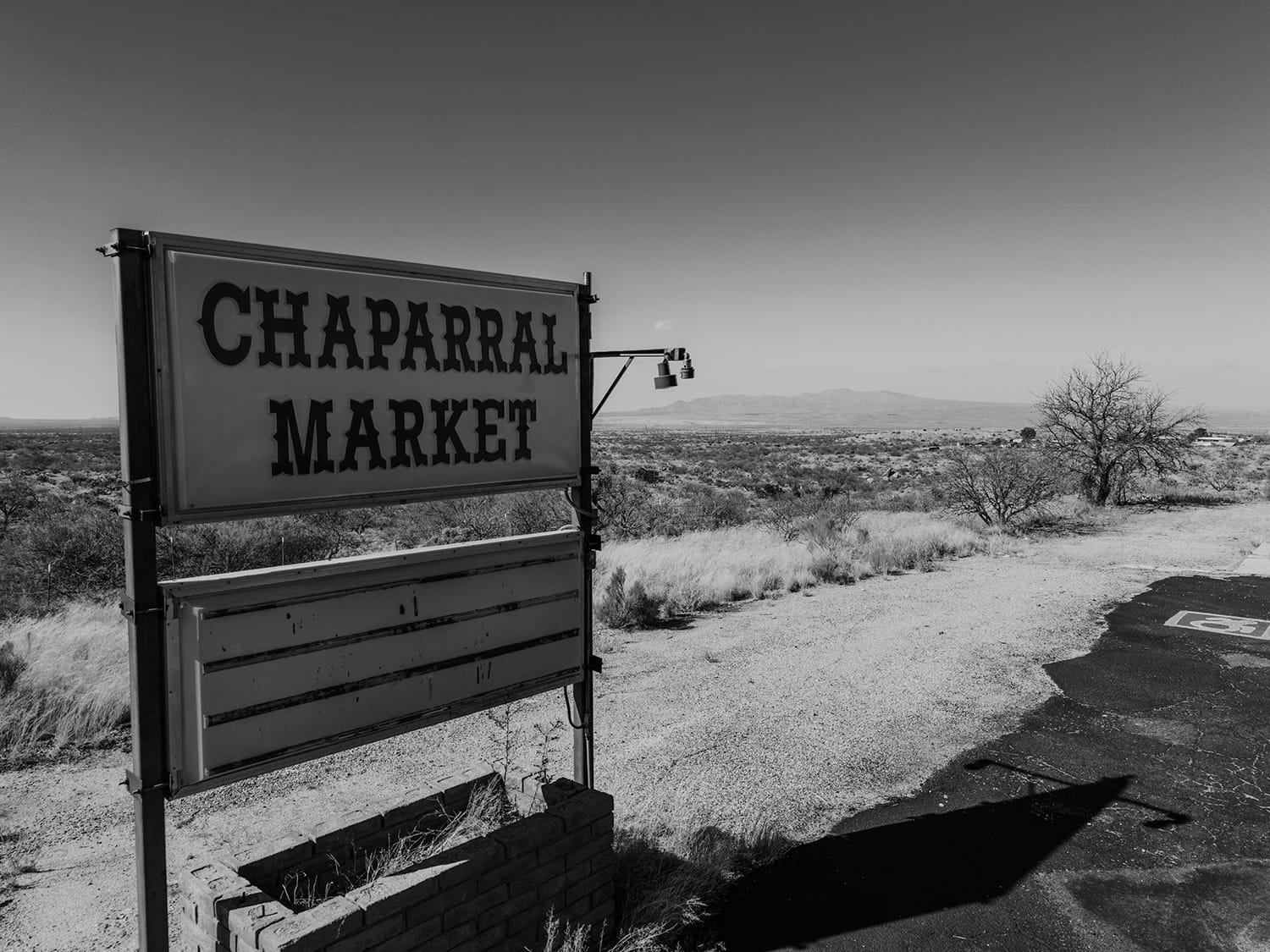 black and white photo of a road stop restaurant