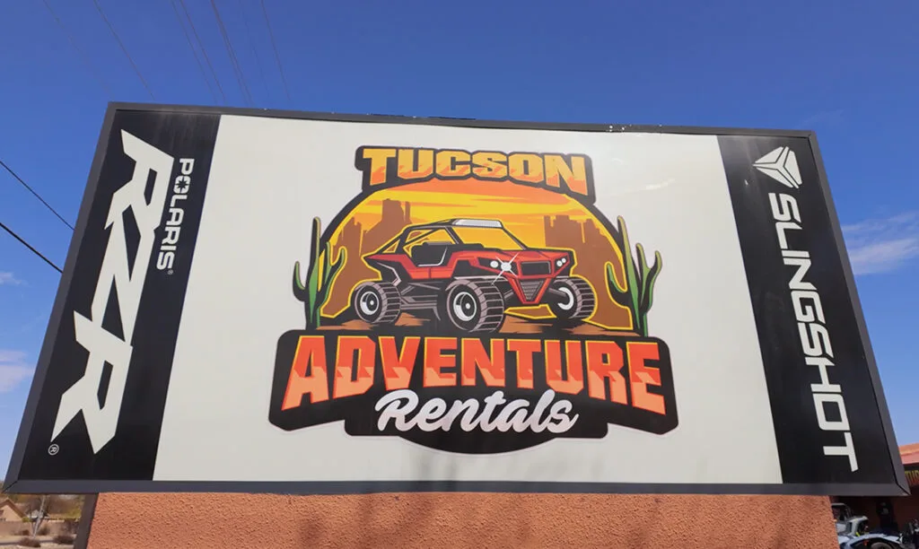 Image of Tucson adventure rentals sign.