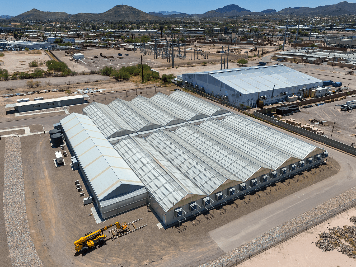 drone photograph of a greenhouse after repair