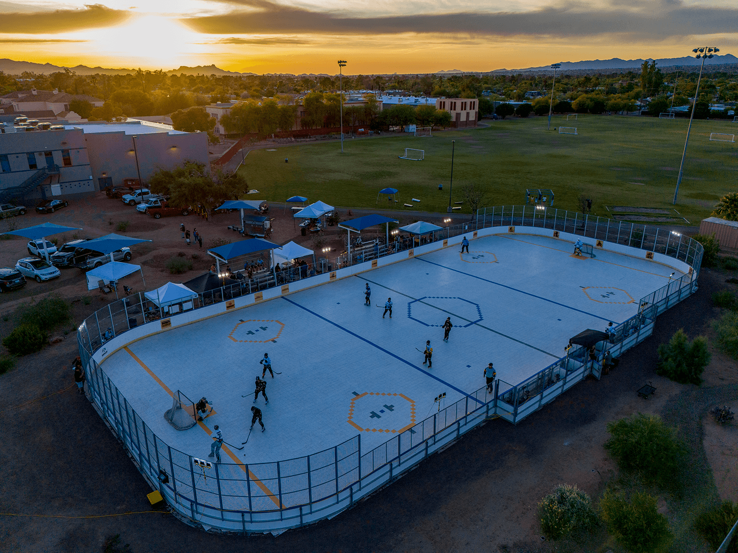 drone photo of a roller rink during sunset