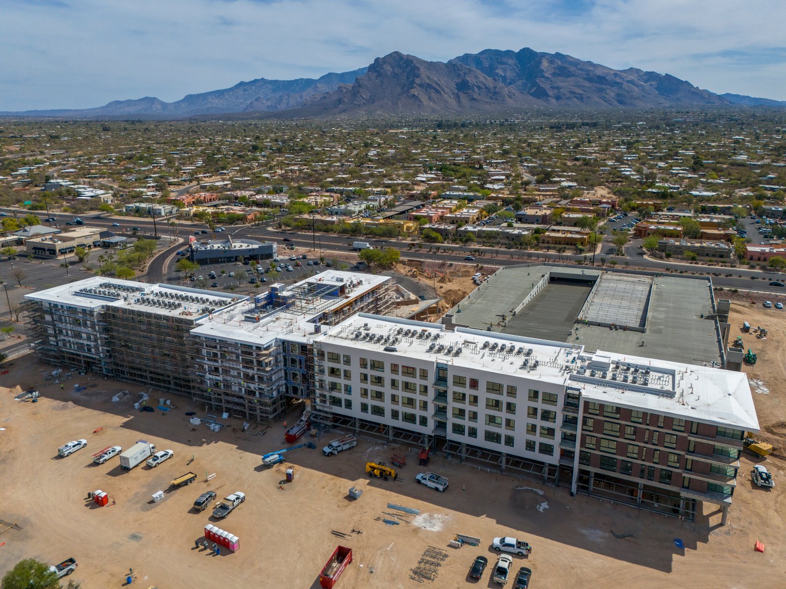 drone photograph of apartment building under construction