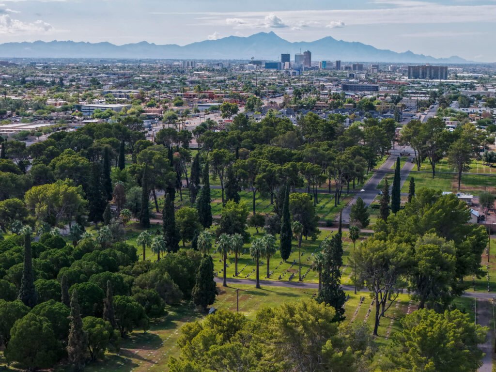 still image of a Tucson Arizona cemetary with the downtown skyline in the background